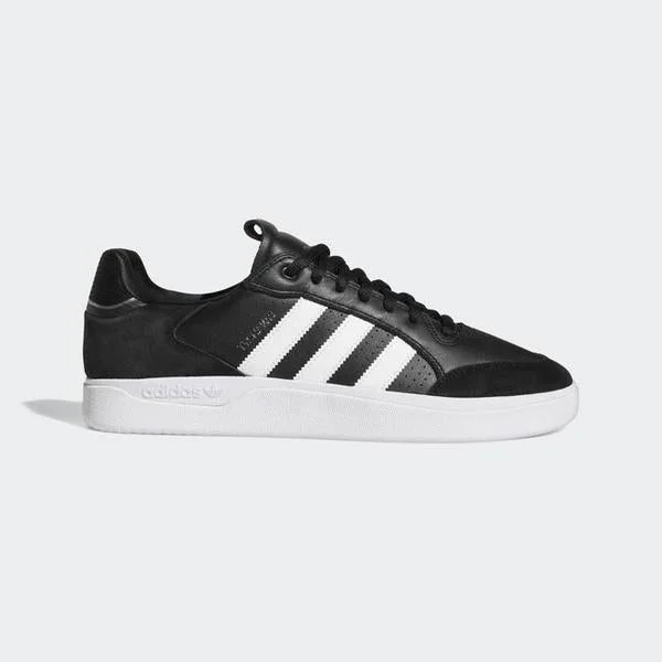 Men's navy blue suede sneakers with gold - toned eyeletsAdidas Tyshawn Low Core Black - Cloud White - Gold Metallic Men's navy blue suede sneakers with gold - toned eyeletsAdidas Tyshawn Low Core Black - Cloud White - Gold Metallic