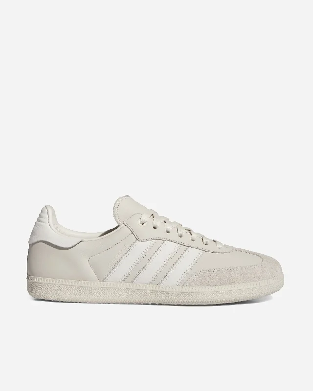 Men's black canvas sneakers with a red soleadidas x Humanrace Samba