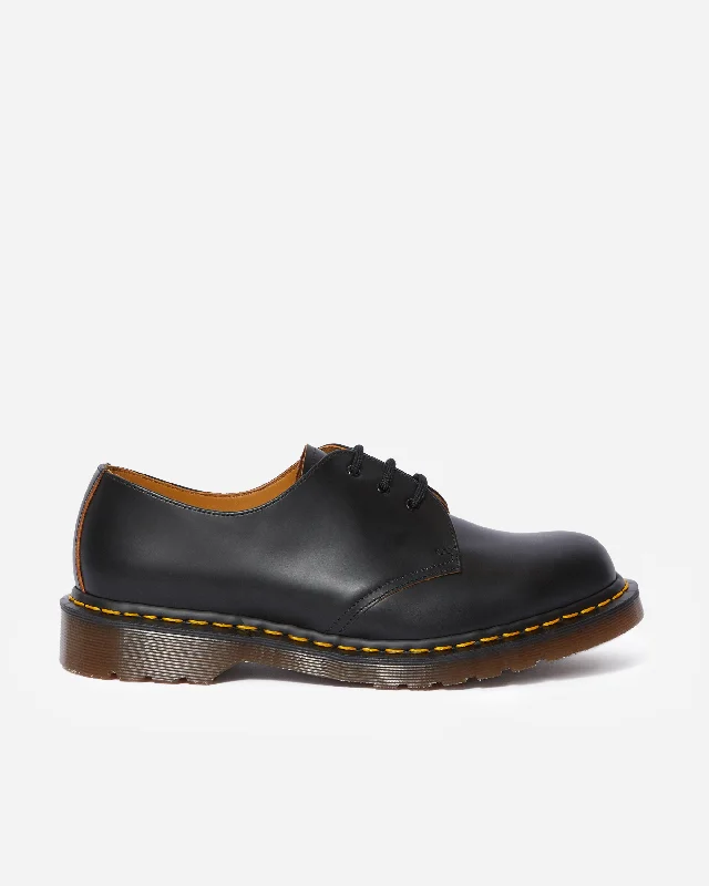 Men's black canvas sneakers with a red soleVintage 1461