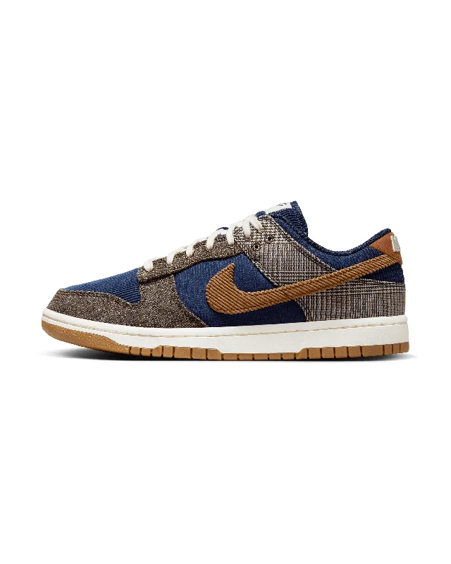 Men's skateboarding sneakers with a vulcanized soleNike Dunk Low - Midnight Navy / Ale Brown-Pale Ivory Men's skateboarding sneakers with a vulcanized soleNike Dunk Low - Midnight Navy / Ale Brown-Pale Ivory