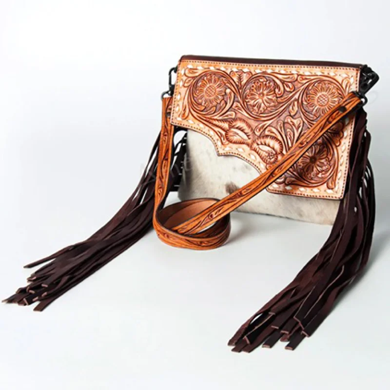 Men's western boots in a rich brown or black leatherAmerican Darling Hide Fringe Tooled Crossbody Purse