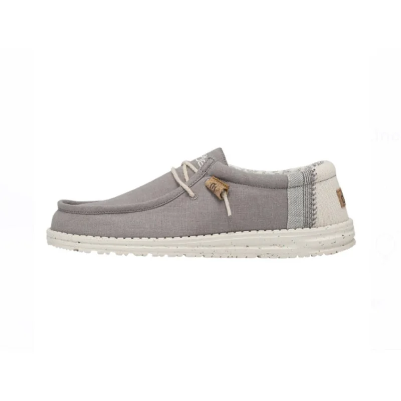 Men's western boots with a decorative inlay on the toe and heelHey Dude Men's Wally Linen Natural Grey Casual Shoe Men's western boots with a decorative inlay on the toe and heelHey Dude Men's Wally Linen Natural Grey Casual Shoe